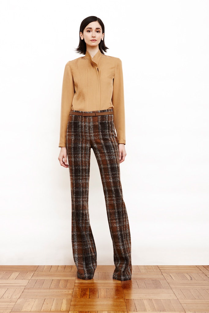 beige silk blouse and brown flared pants
