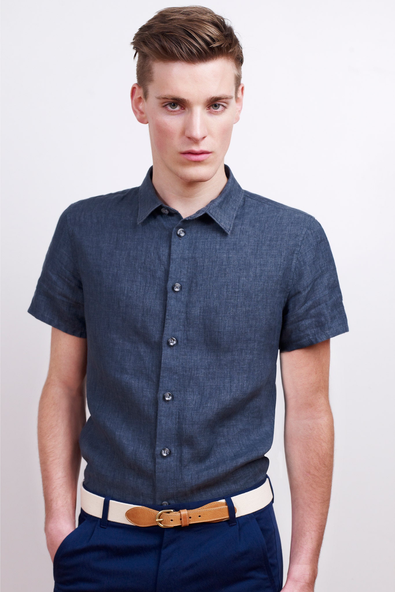 blue fitted shirt with tailored pants