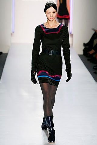 black fitted dress with gloves and boots