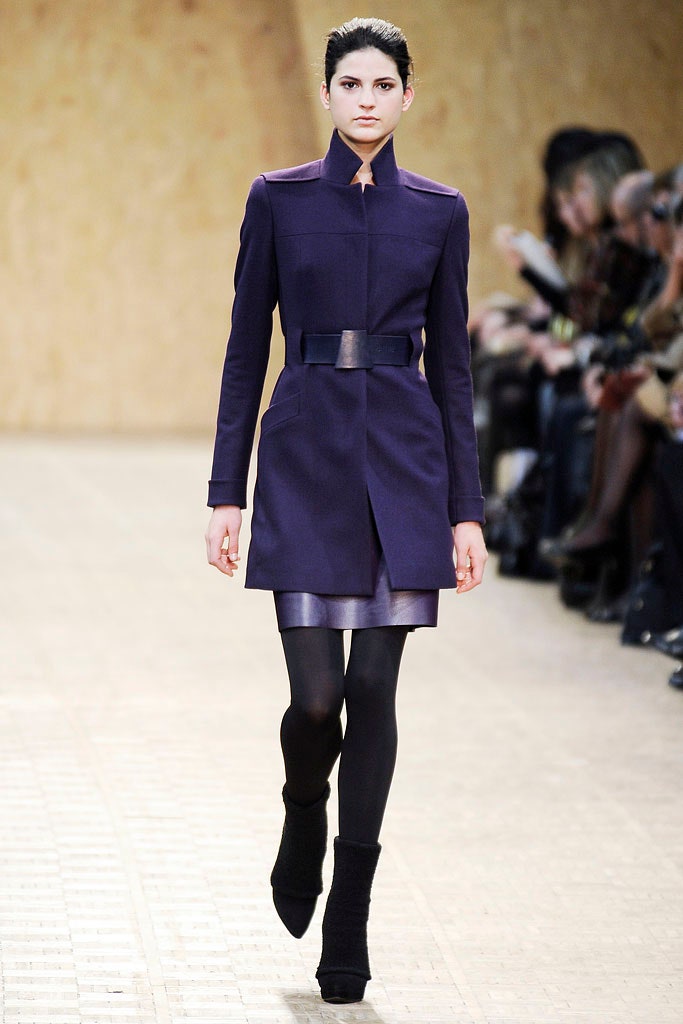 fitted purple coat and black dress