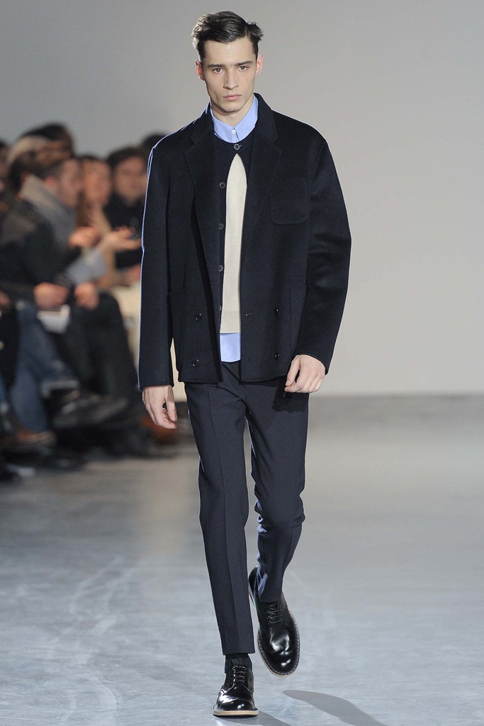 black wool jacket with blue shirt