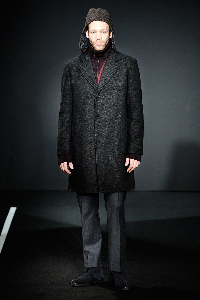 black wool long-sleeve collared structured buttoned coat