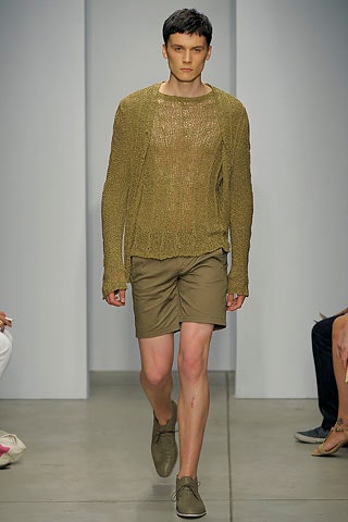 brown relaxed sweater with beige shorts