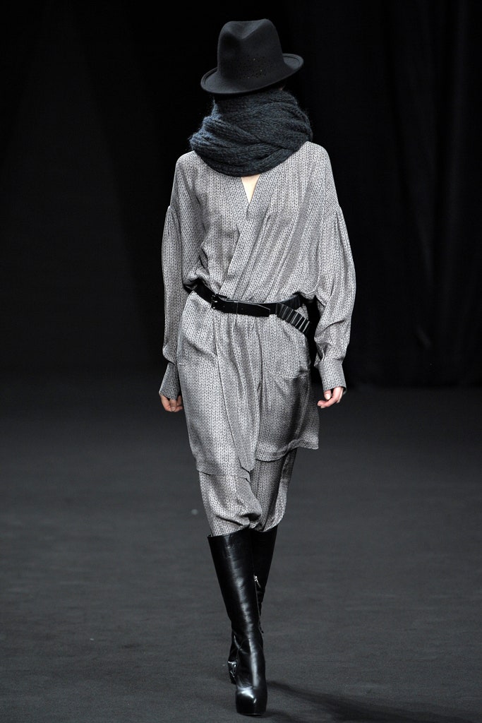 gray relaxed jumpsuit with black accessories