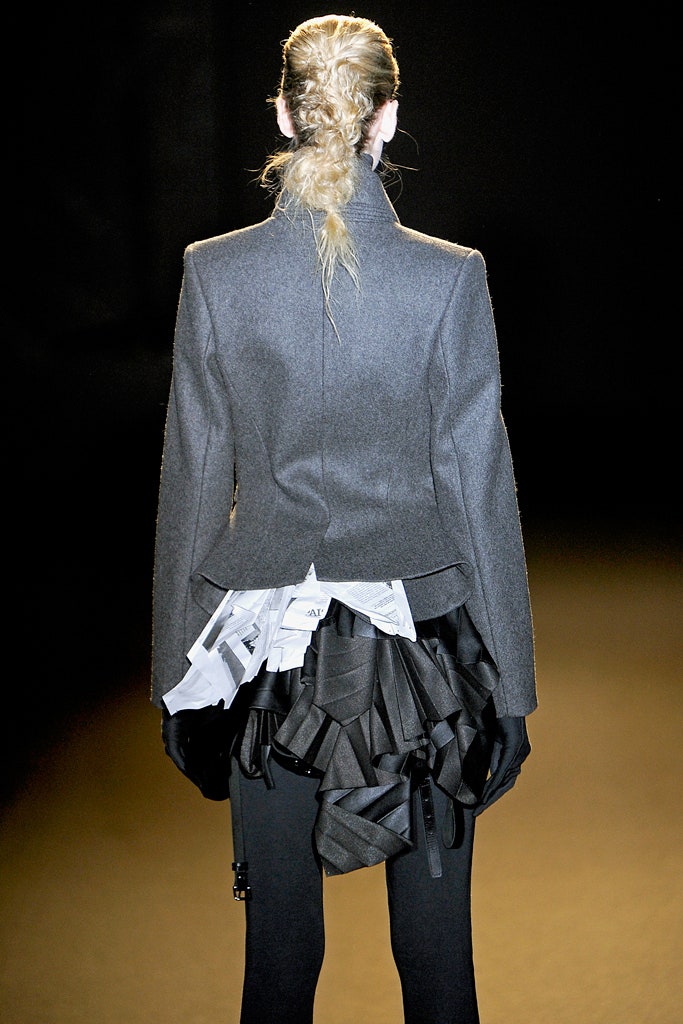 gray structured jacket with black skirt