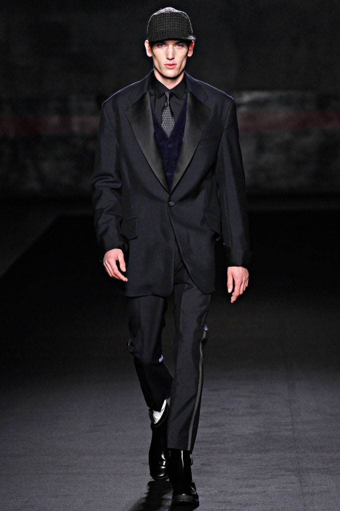 black tailored suit with vest