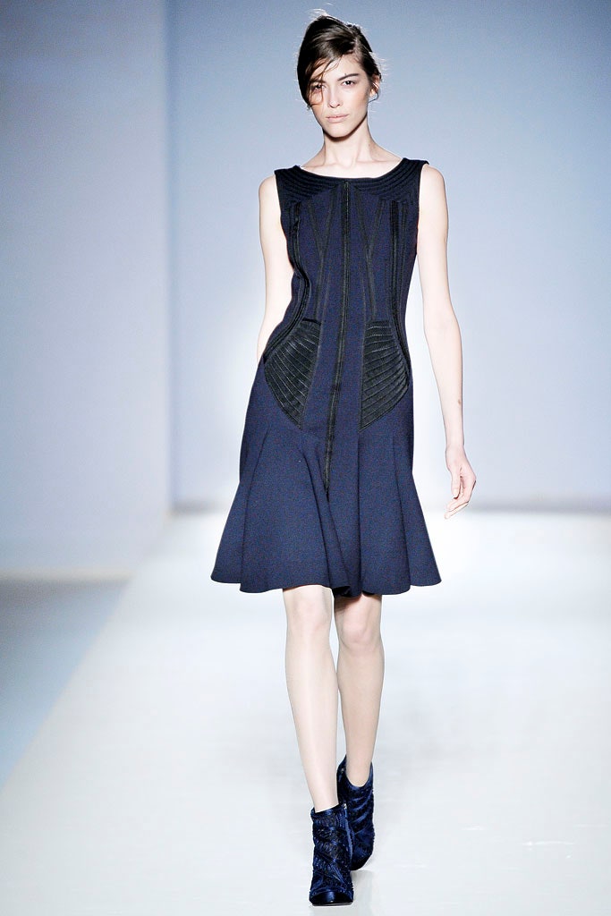 fitted blue sleeveless dress
