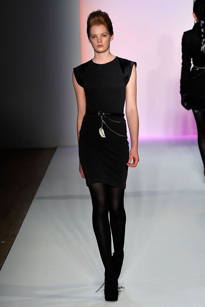 fitted black sleeveless dress