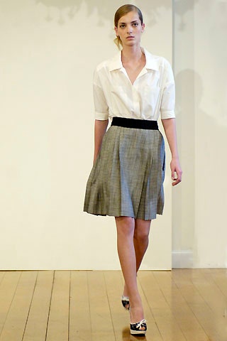 white fitted shirt gray pleated skirt