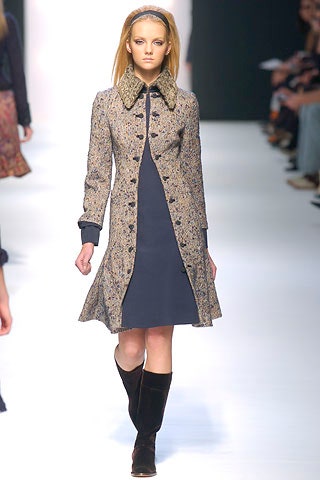 beige coat with navy dress