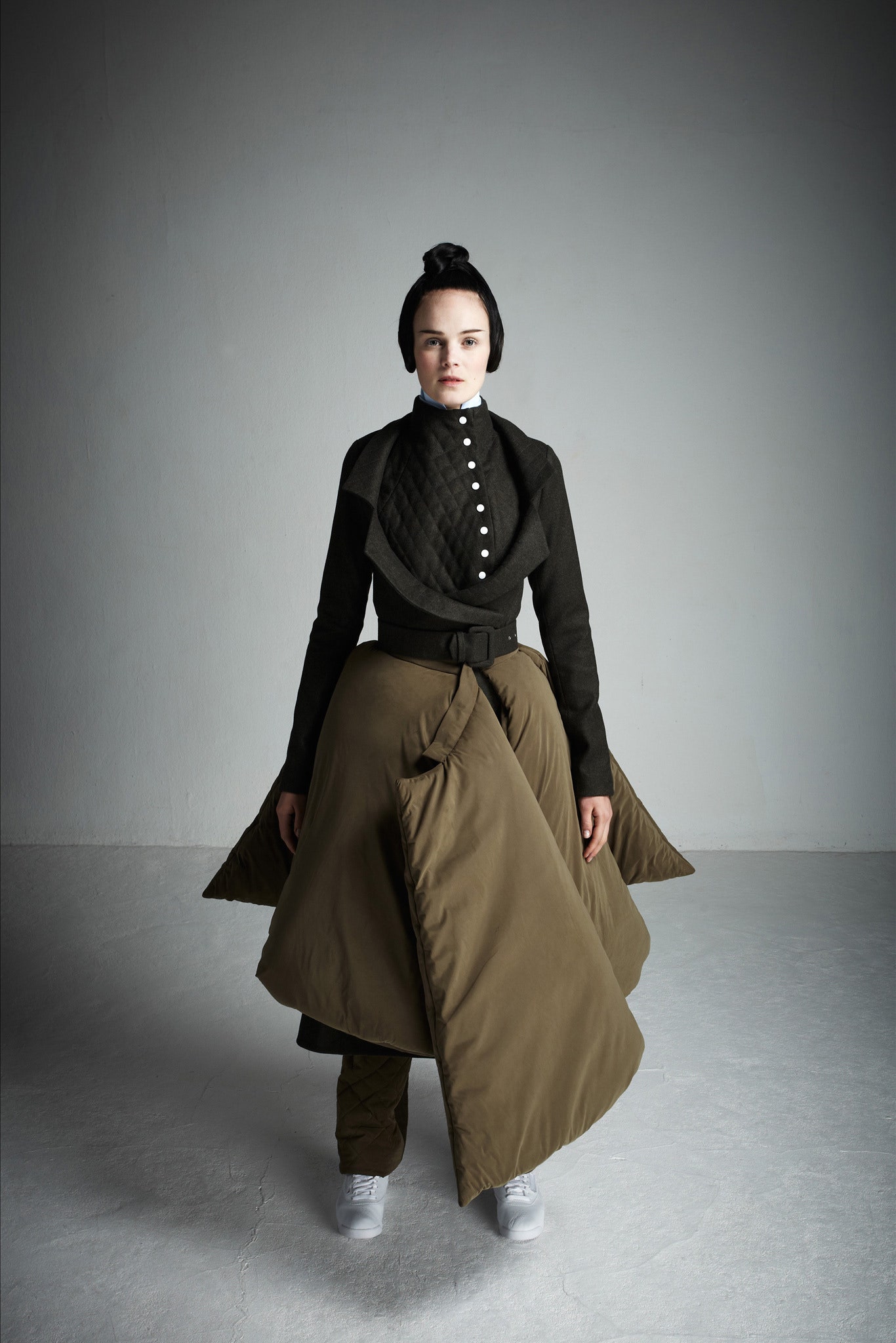 black fitted jacket with brown flared skirt