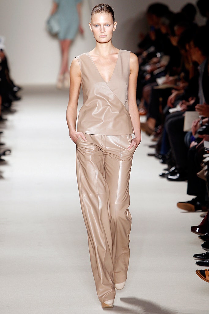 beige leather fitted top and relaxed pants