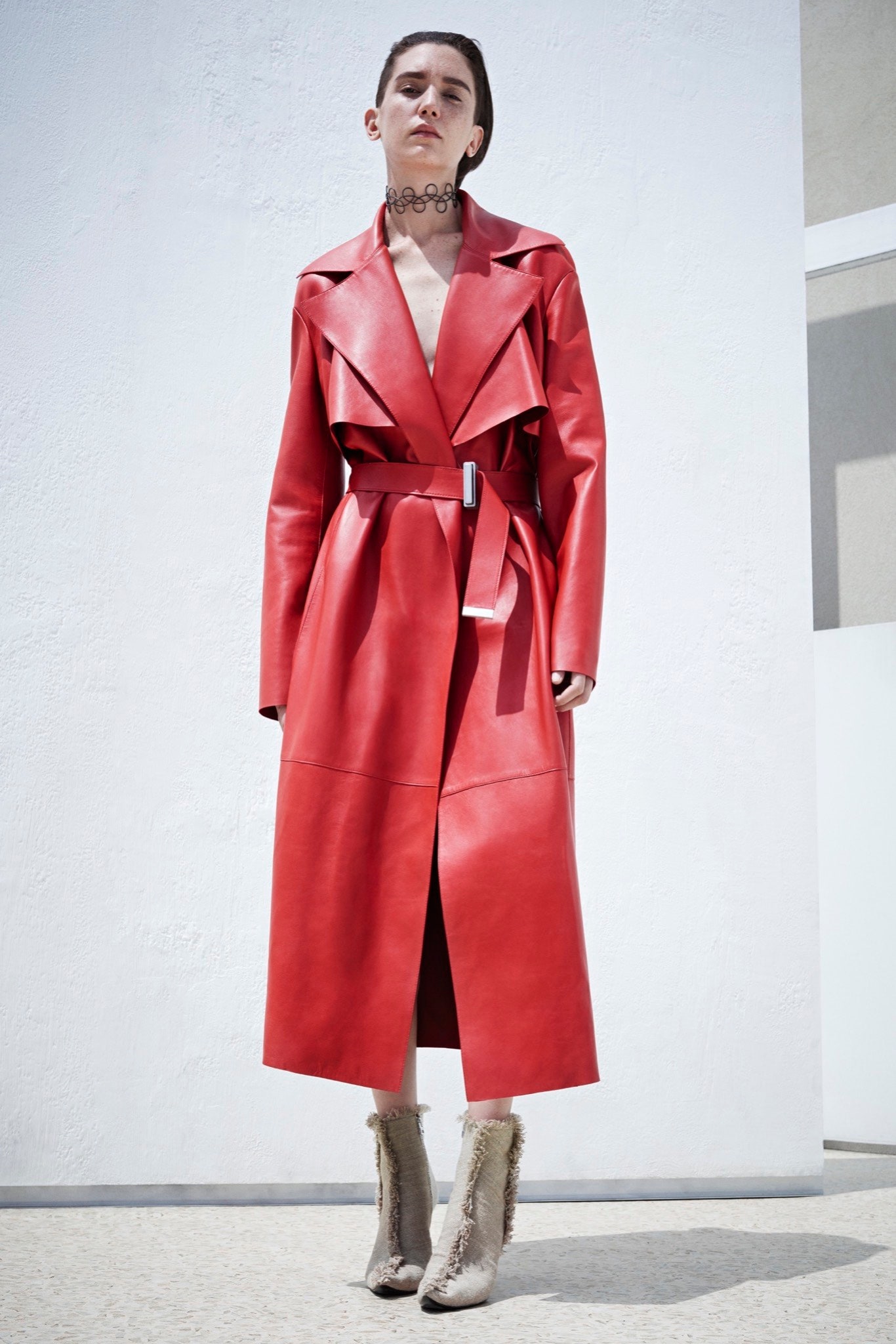 red leather belted coat