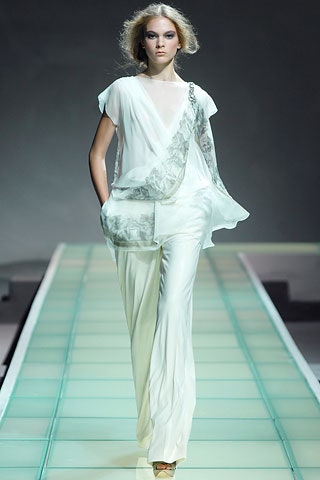 white silk relaxed top and fitted pants