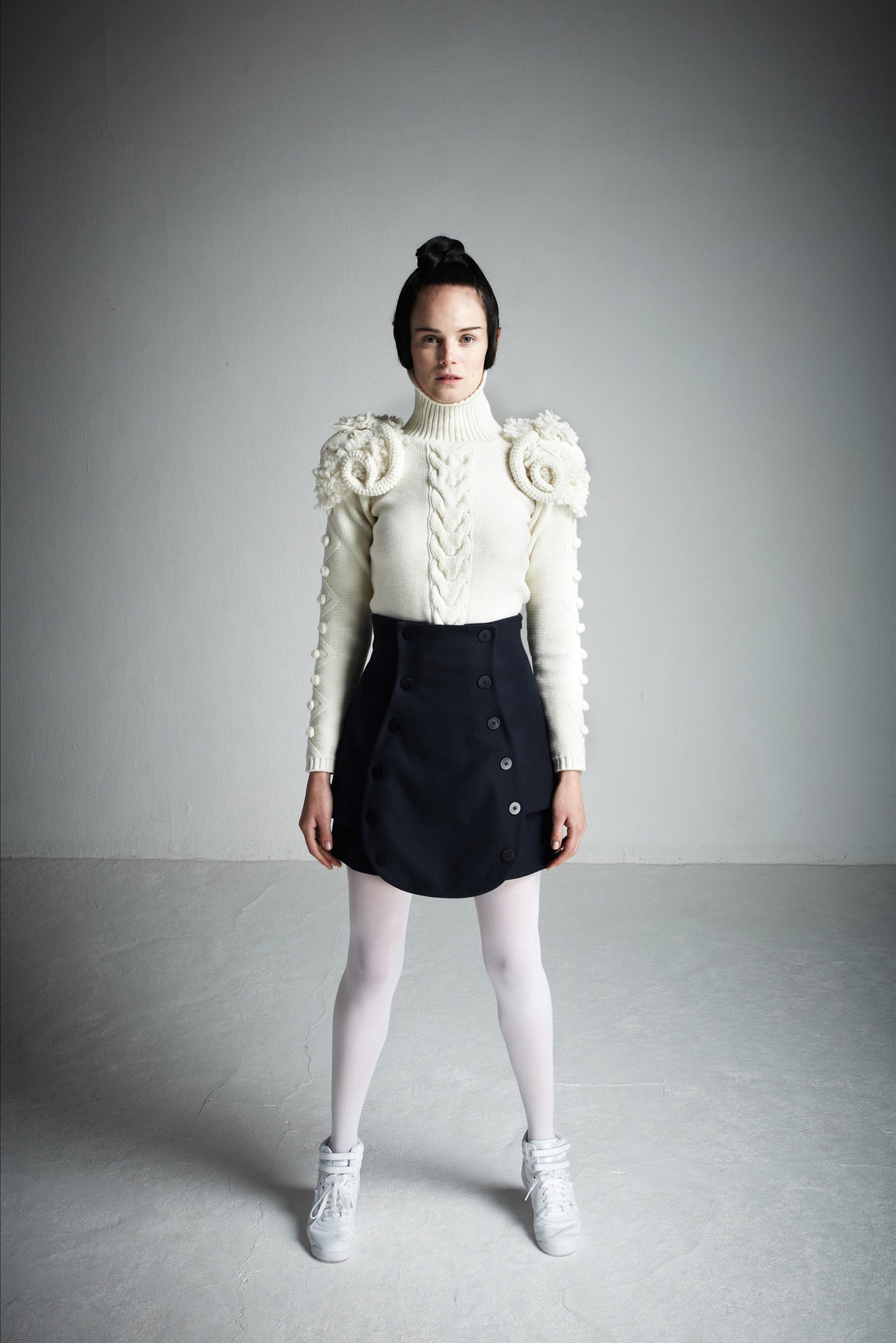 white wool fitted top with black skirt