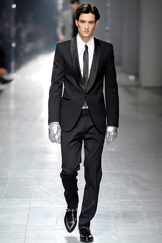 black tailored suit with gloves