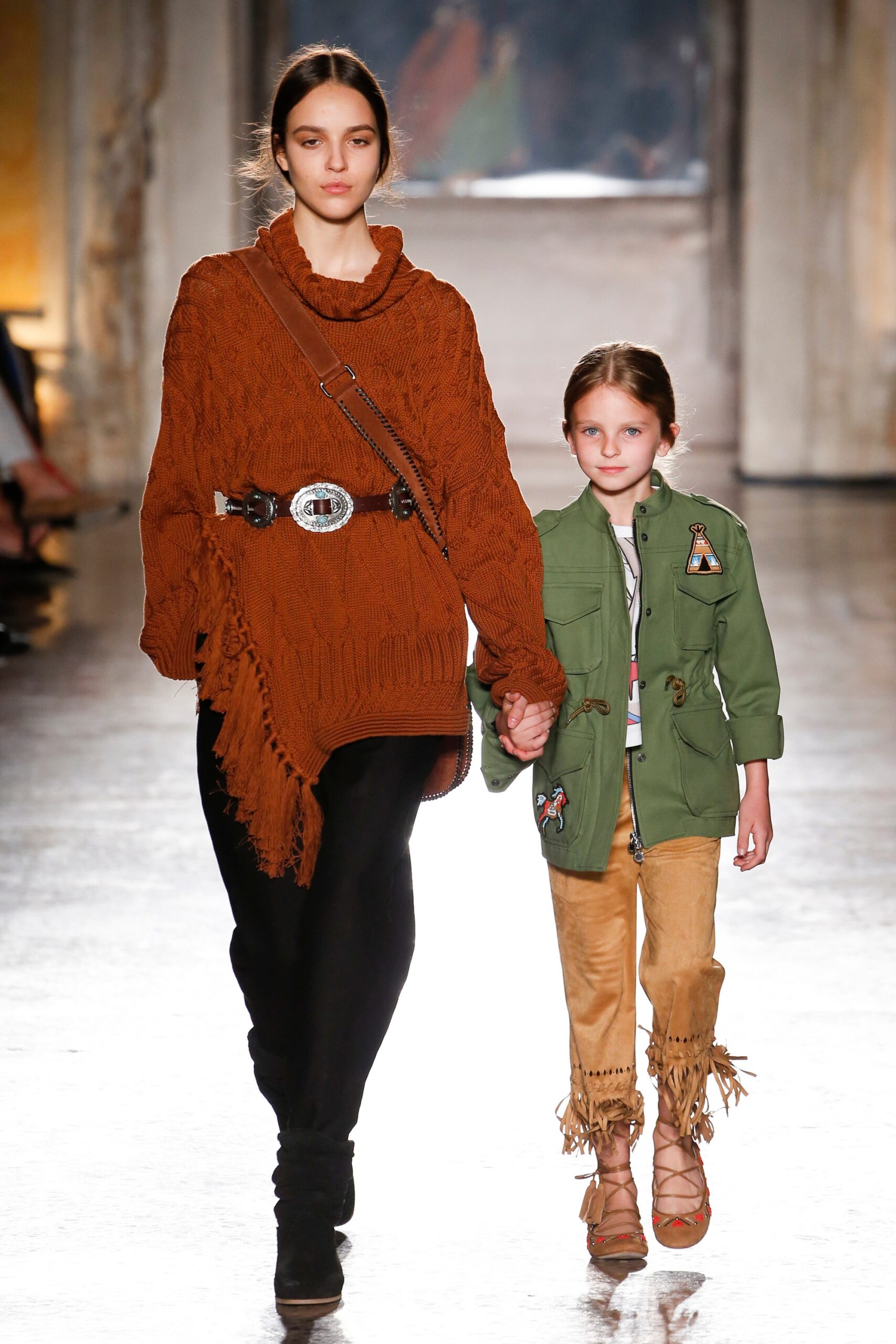 brown relaxed sweater with fringes