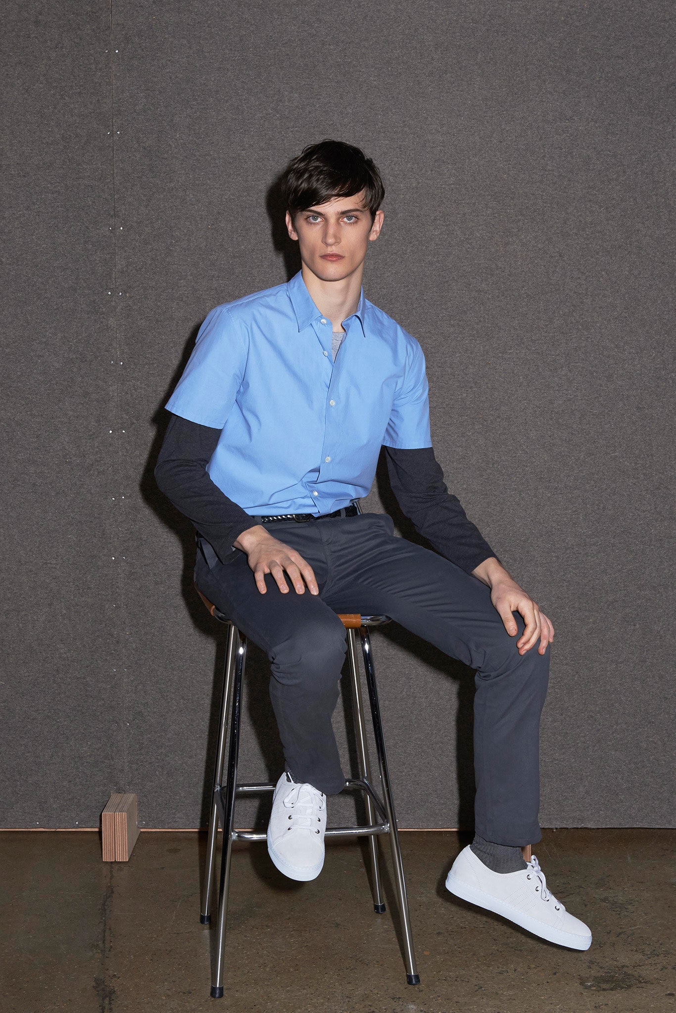 blue cotton shirt with gray pants