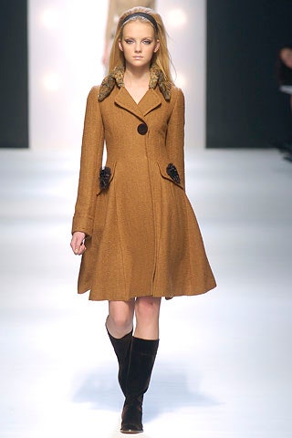 brown wool fitted coat with black boots