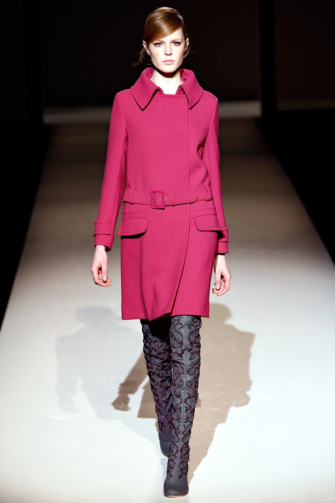 pink wool belted coat with black boots