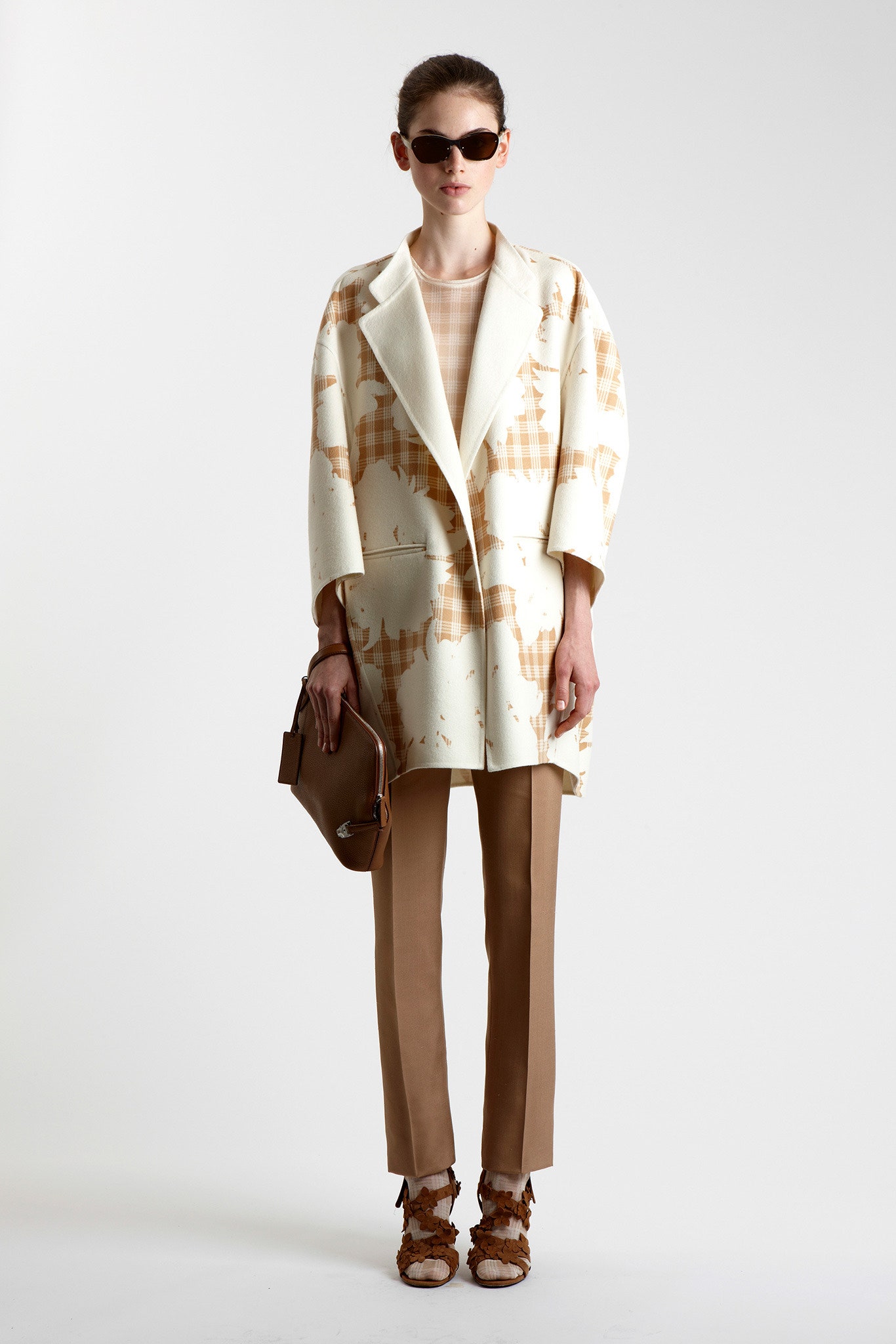 printed beige coat with brown pants