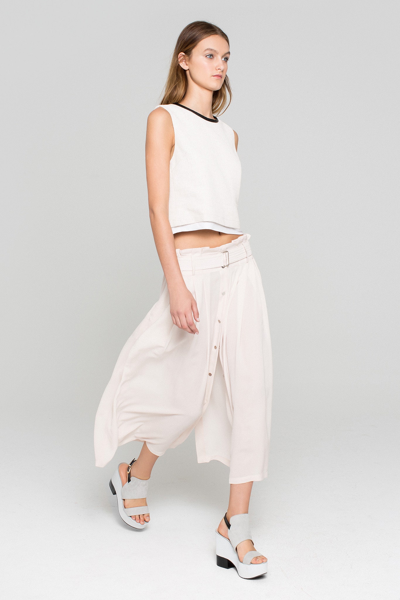 beige cotton relaxed high-waisted buttoned pants