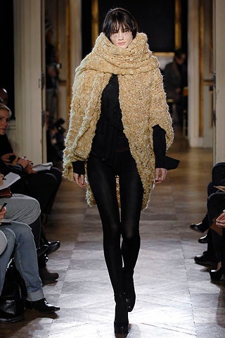 beige wool coat with black blouse