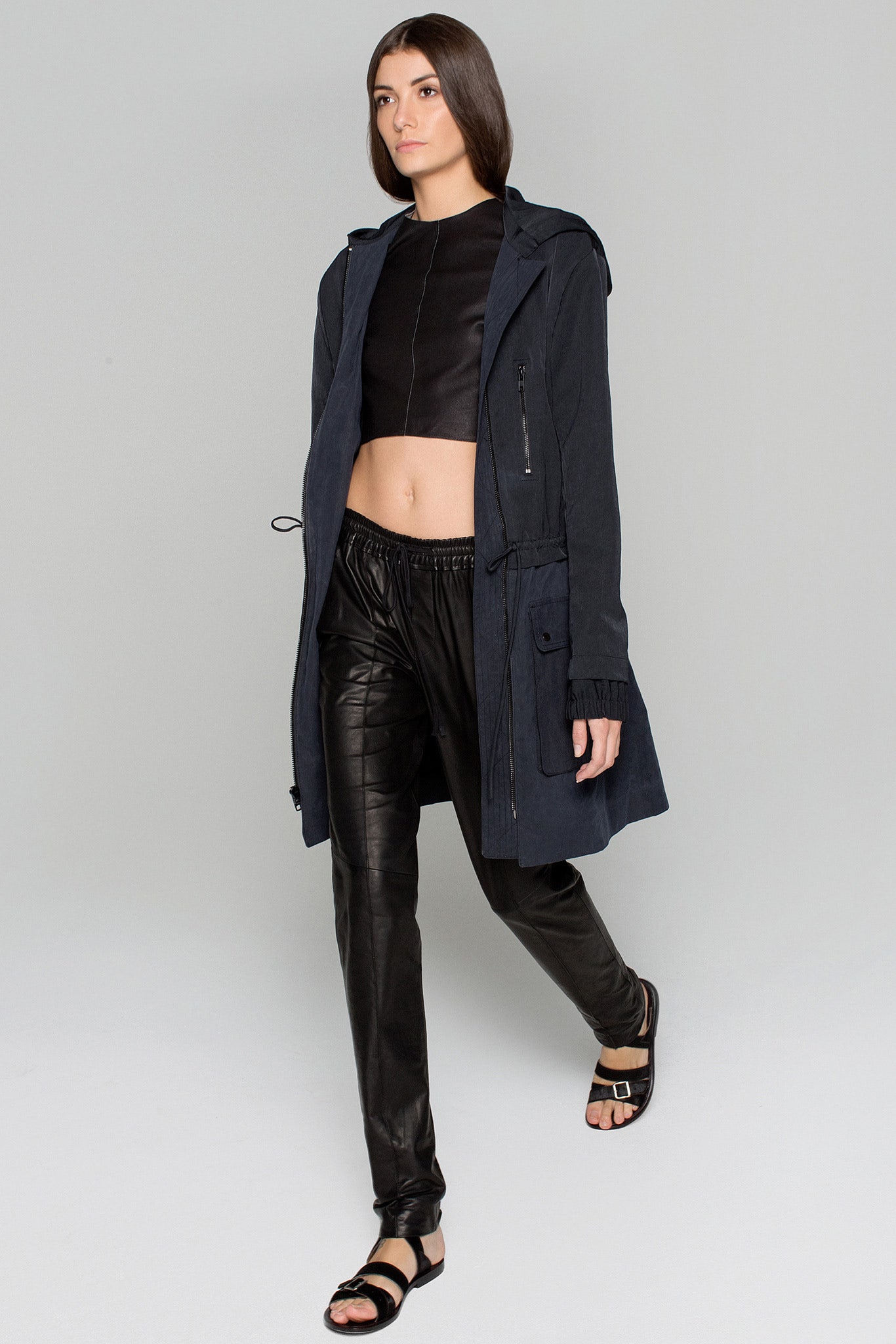 black relaxed coat with cropped top