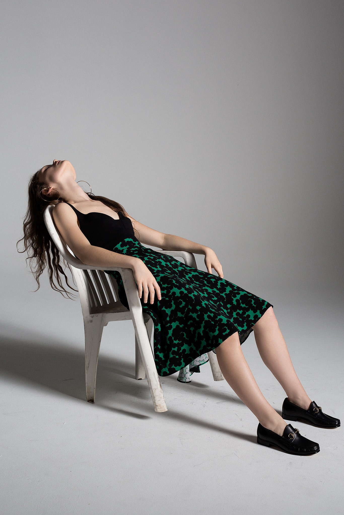 black and green flared midi dress