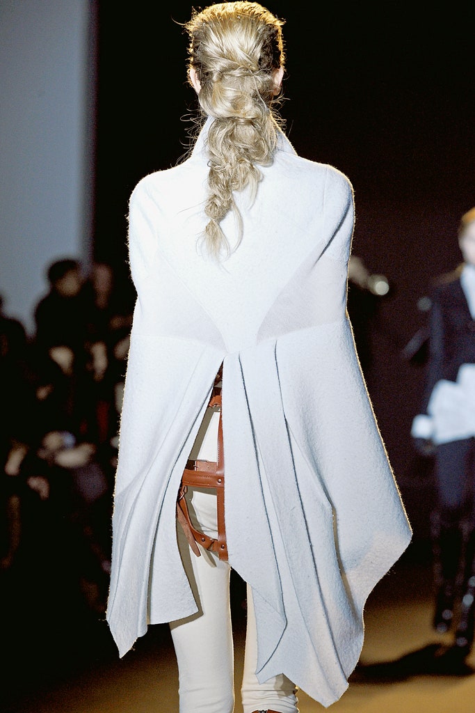 white wool cape with fitted pants