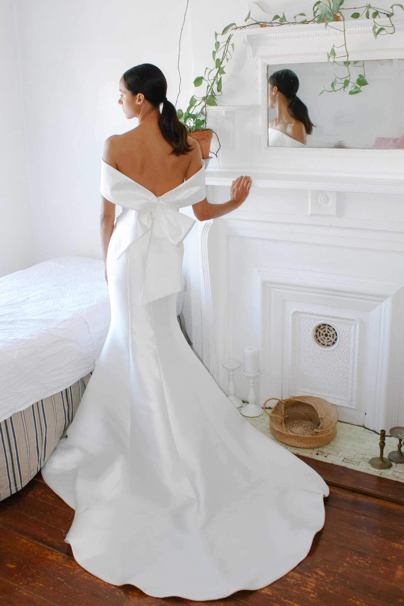 white silk off-shoulder gown