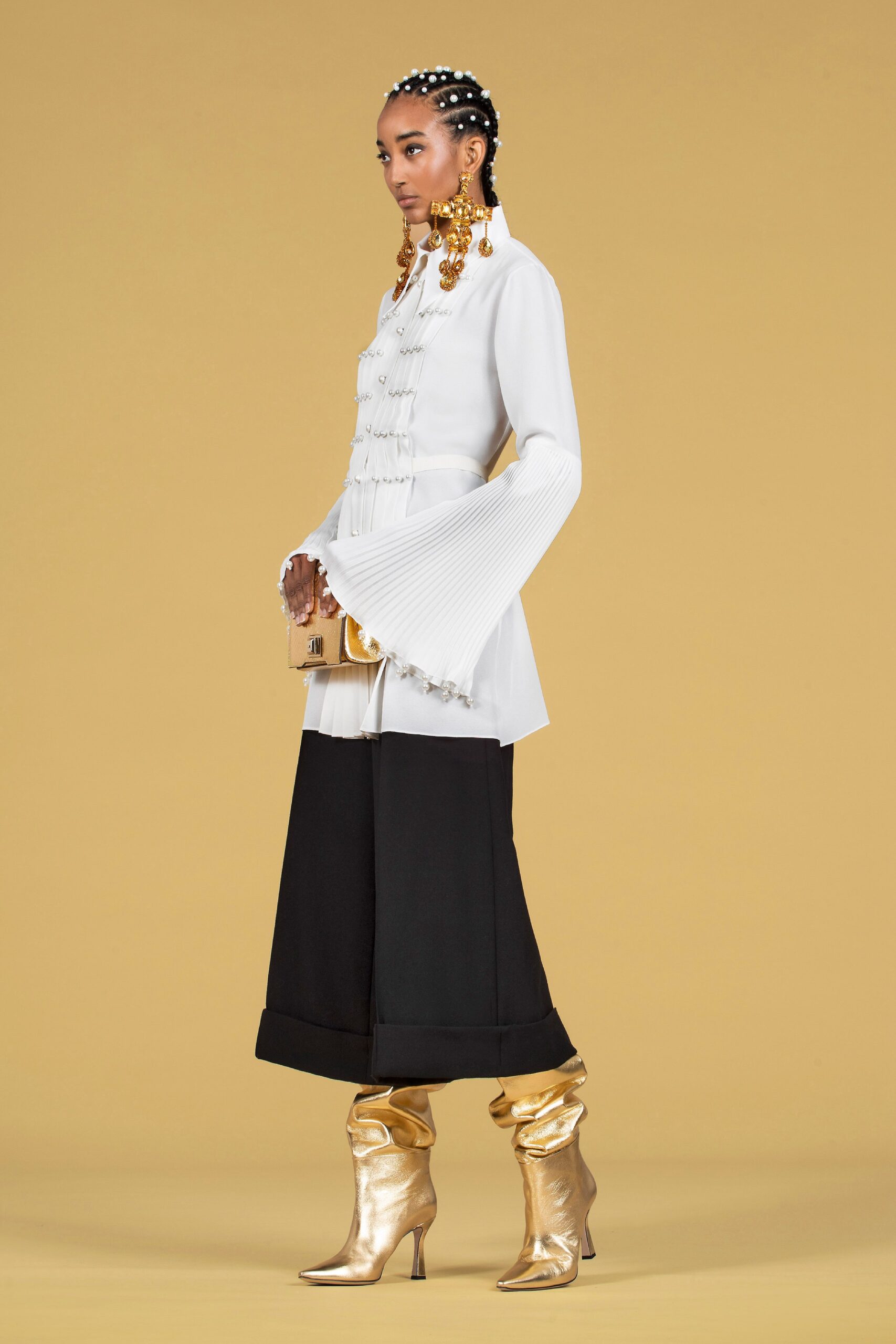 white fitted blouse with black pants