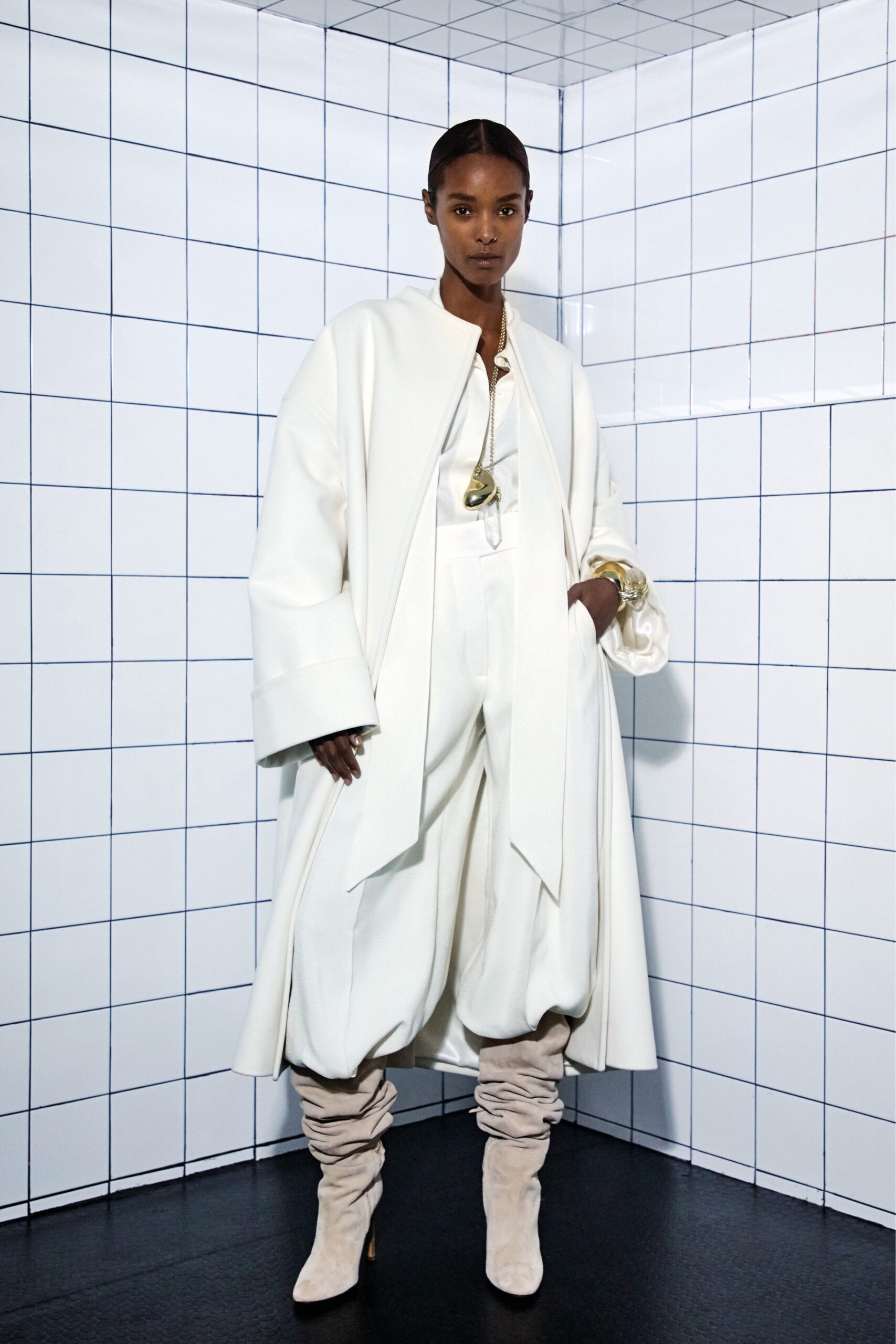 white wool long-sleeve collared oversized draped coat