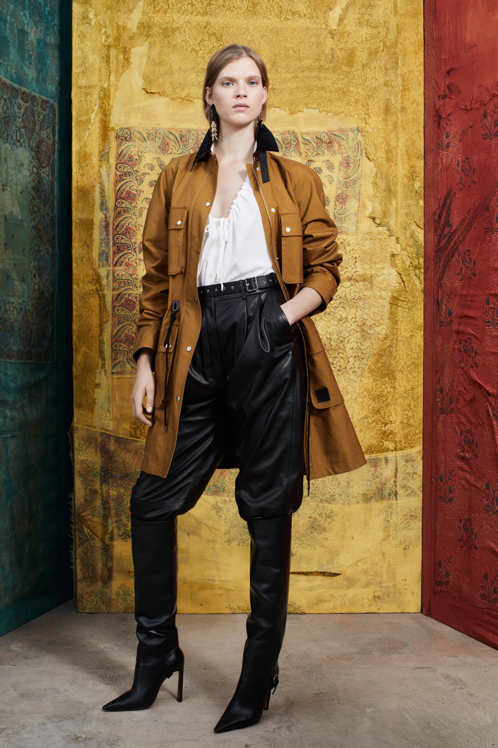 brown jacket white blouse black pants