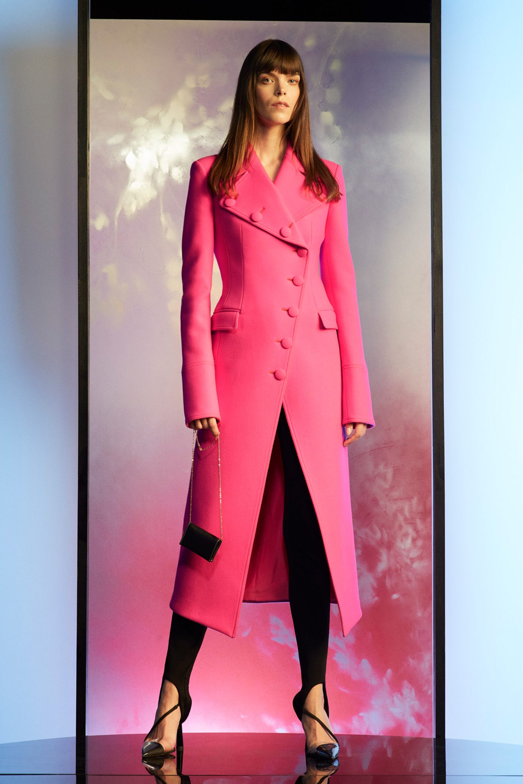 fitted pink coat with black pants