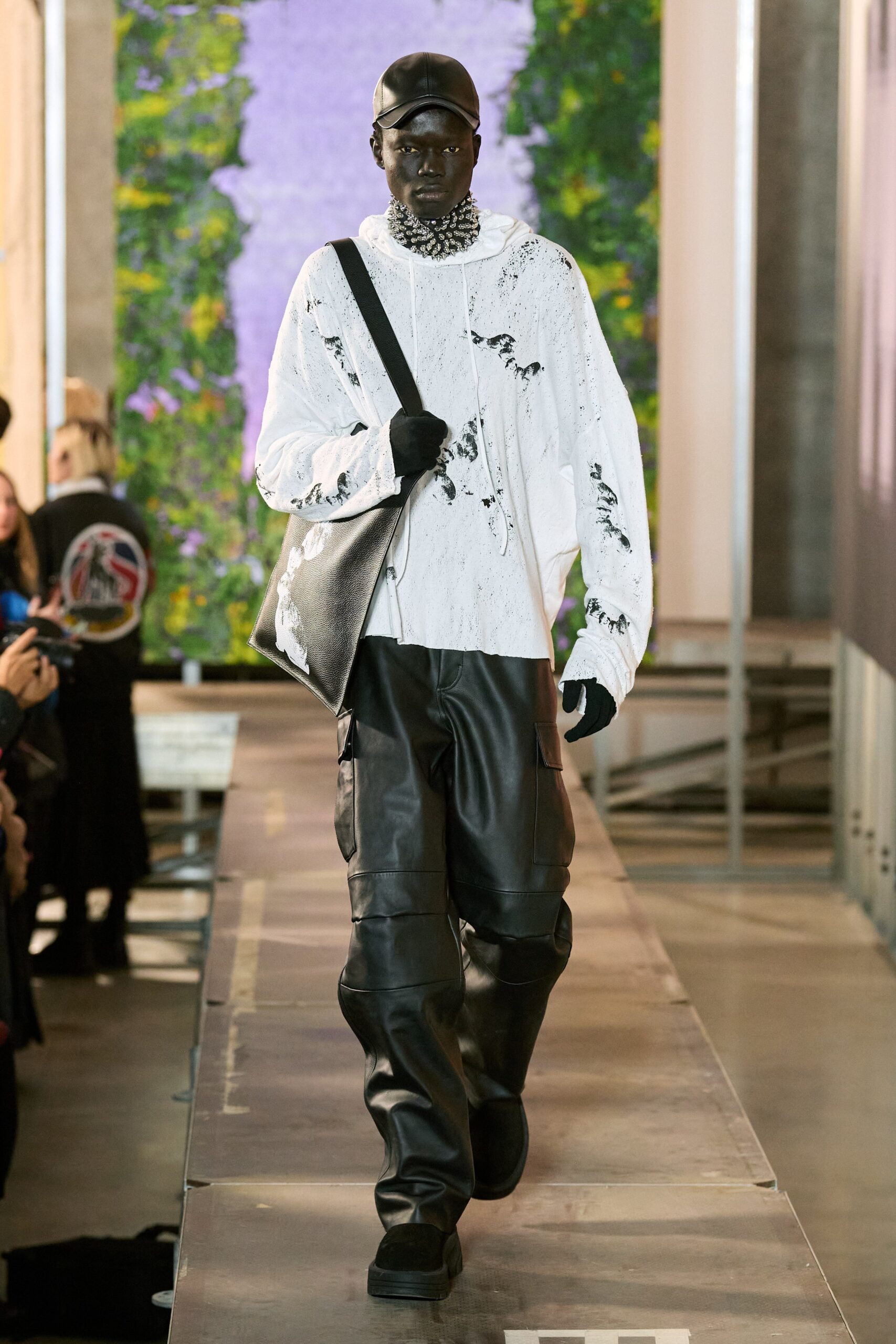 white distressed hoodie with black cargo pants