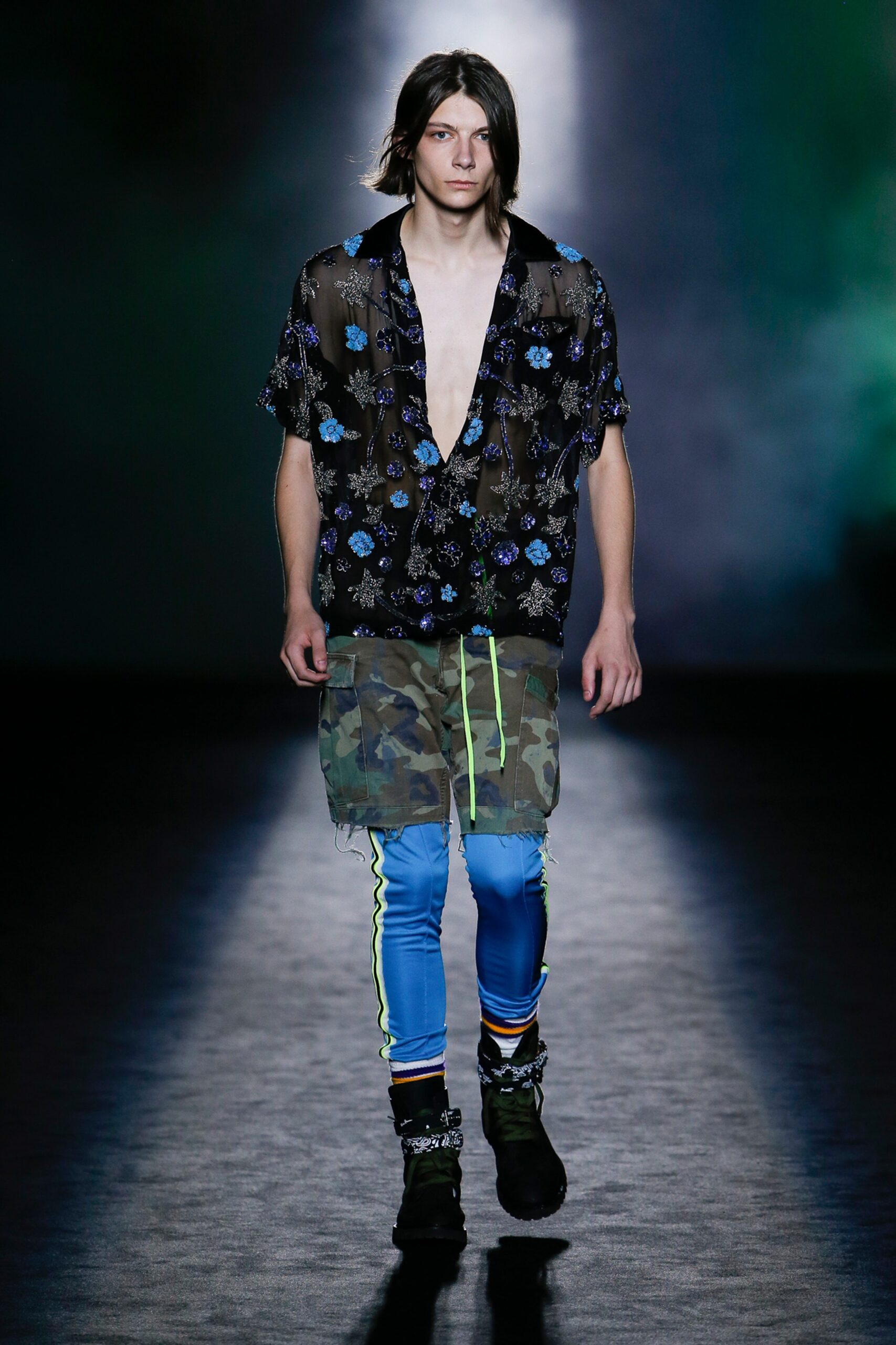 black floral shirt with camouflage shorts