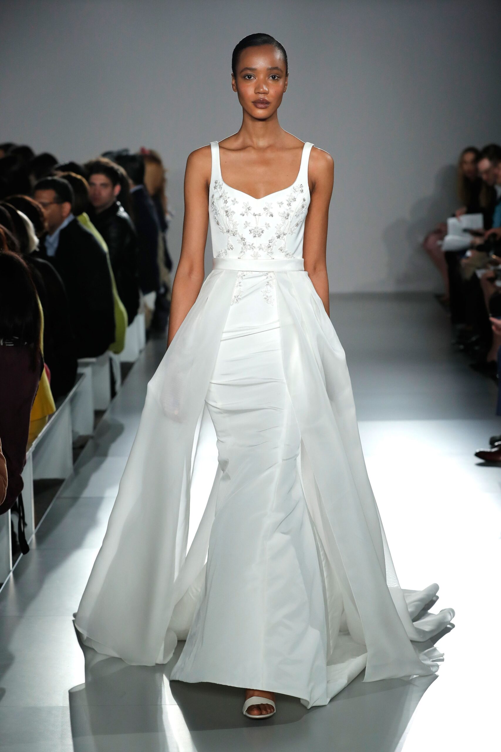white silk embroidered gown