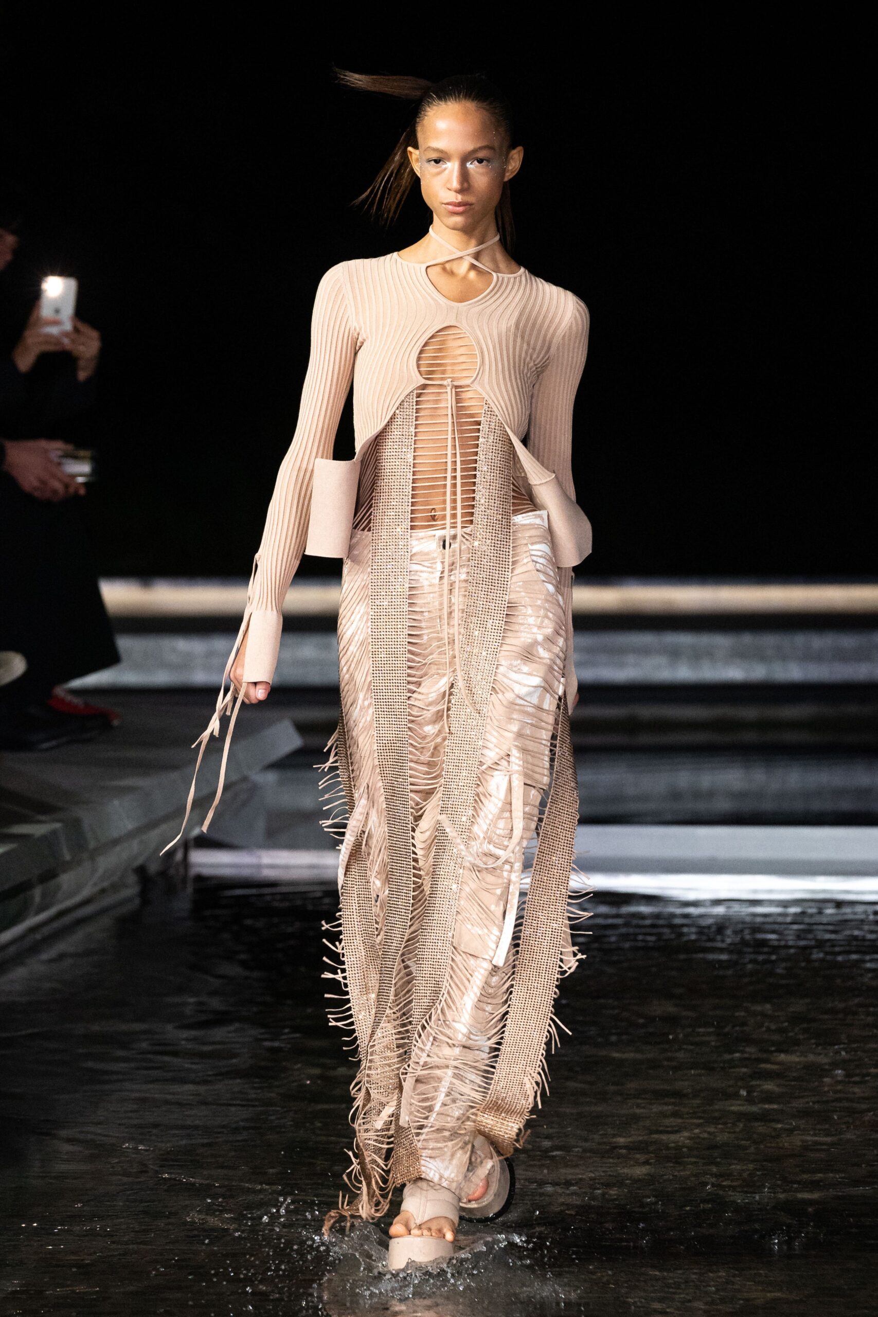 beige fitted top with fringed pants