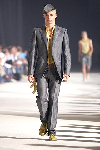 gray tailored suit with yellow shirt
