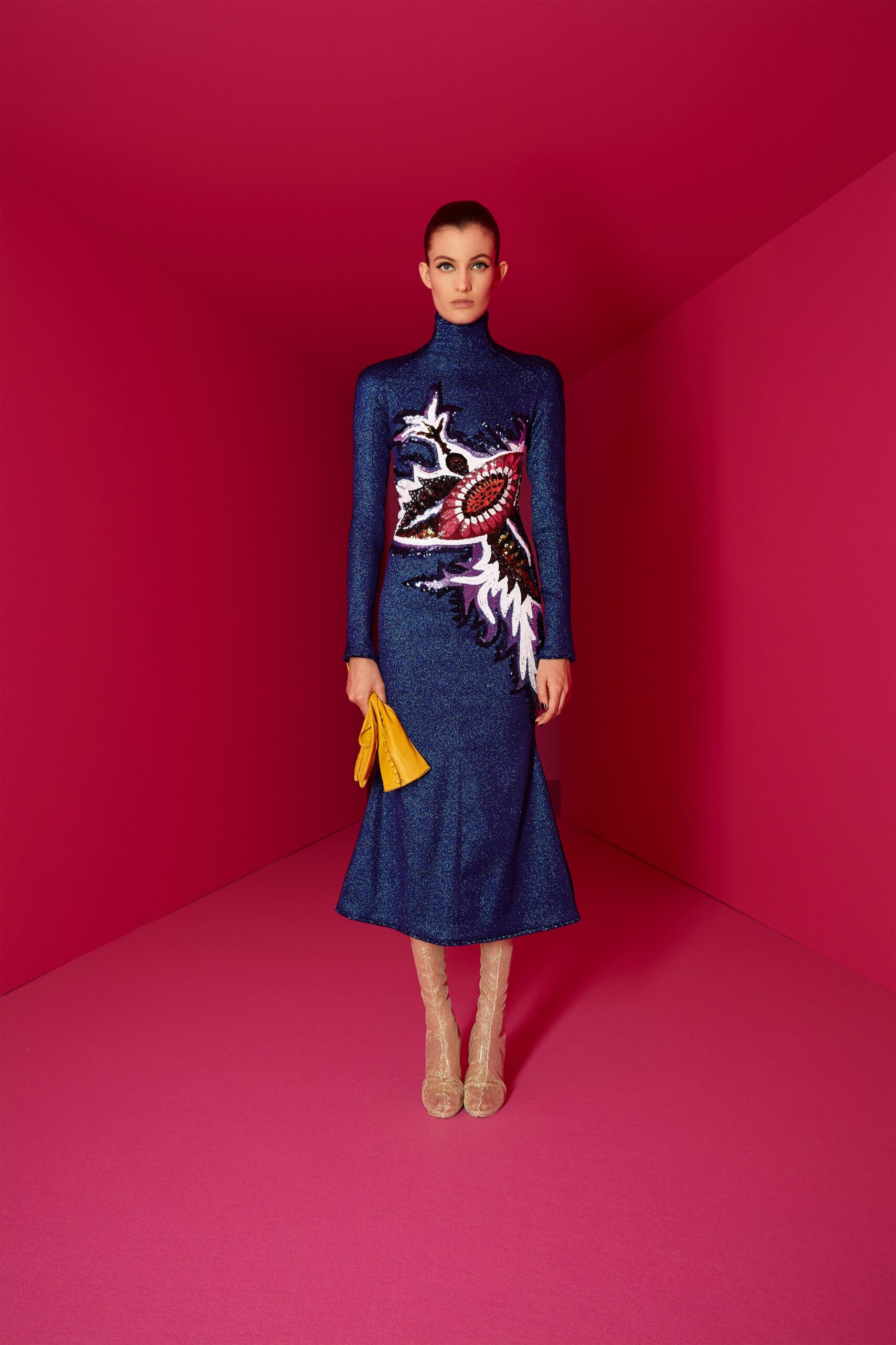 blue embroidered midi dress with clutch