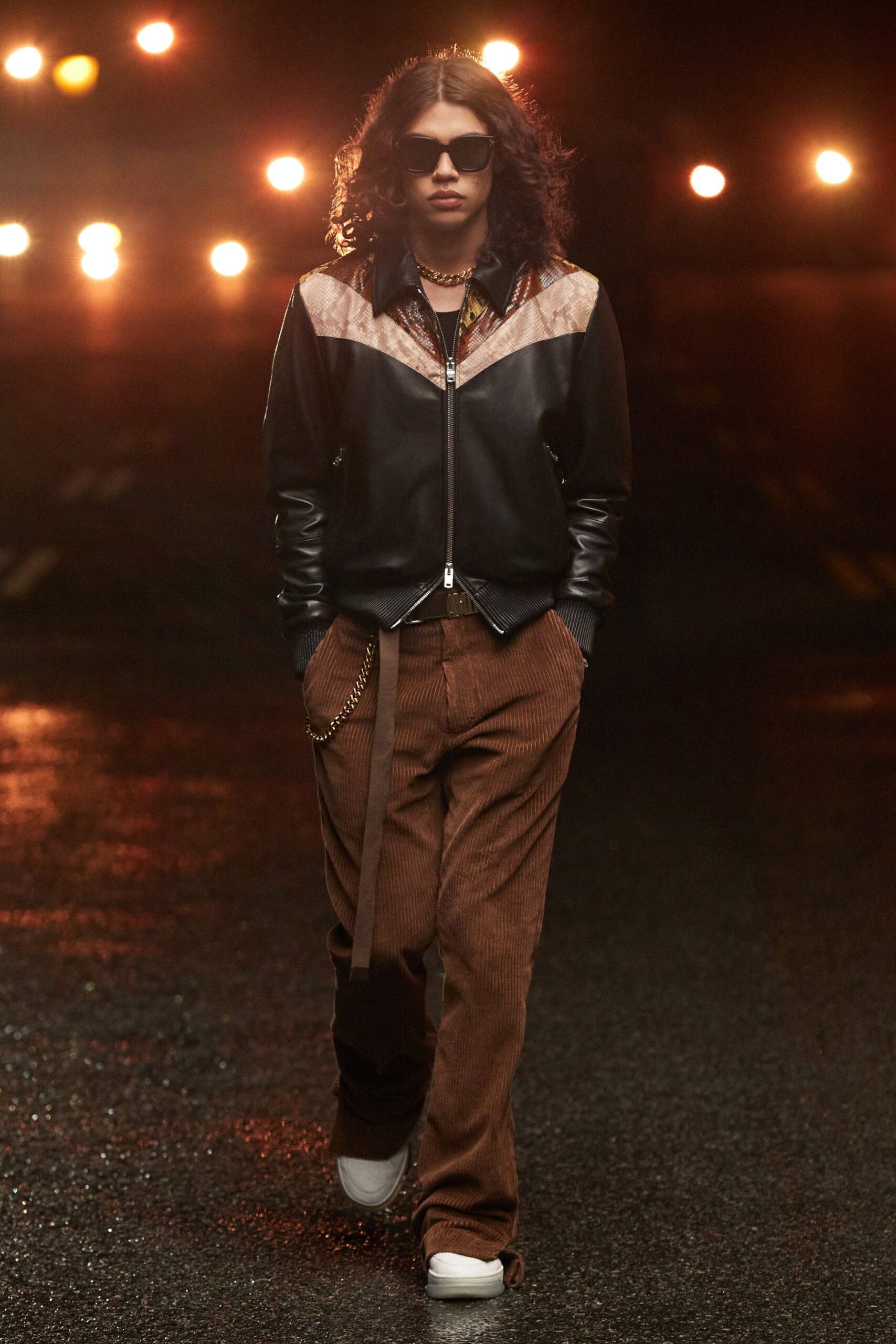 black leather jacket with brown pants