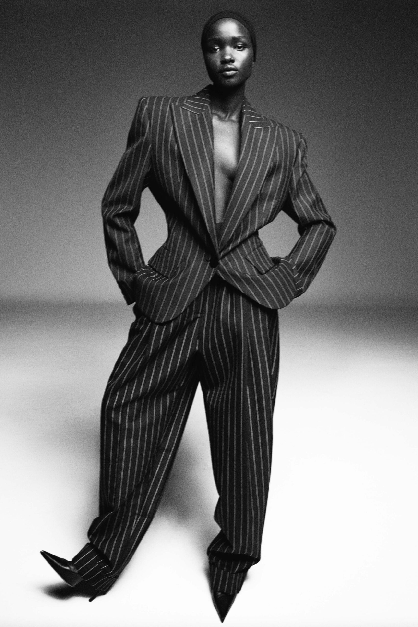black wool long-sleeve collared tailored striped suit
