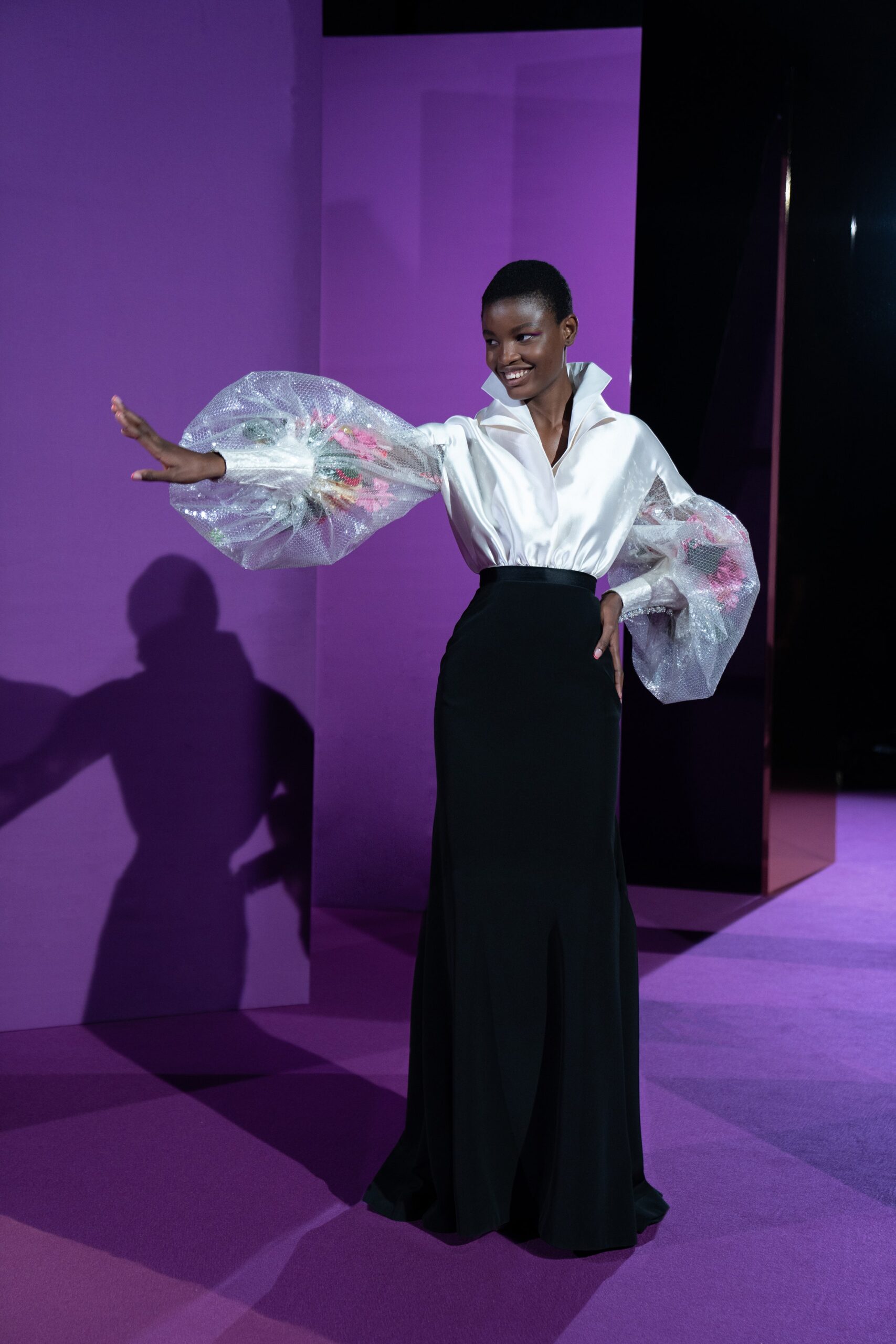 white silk blouse and black skirt