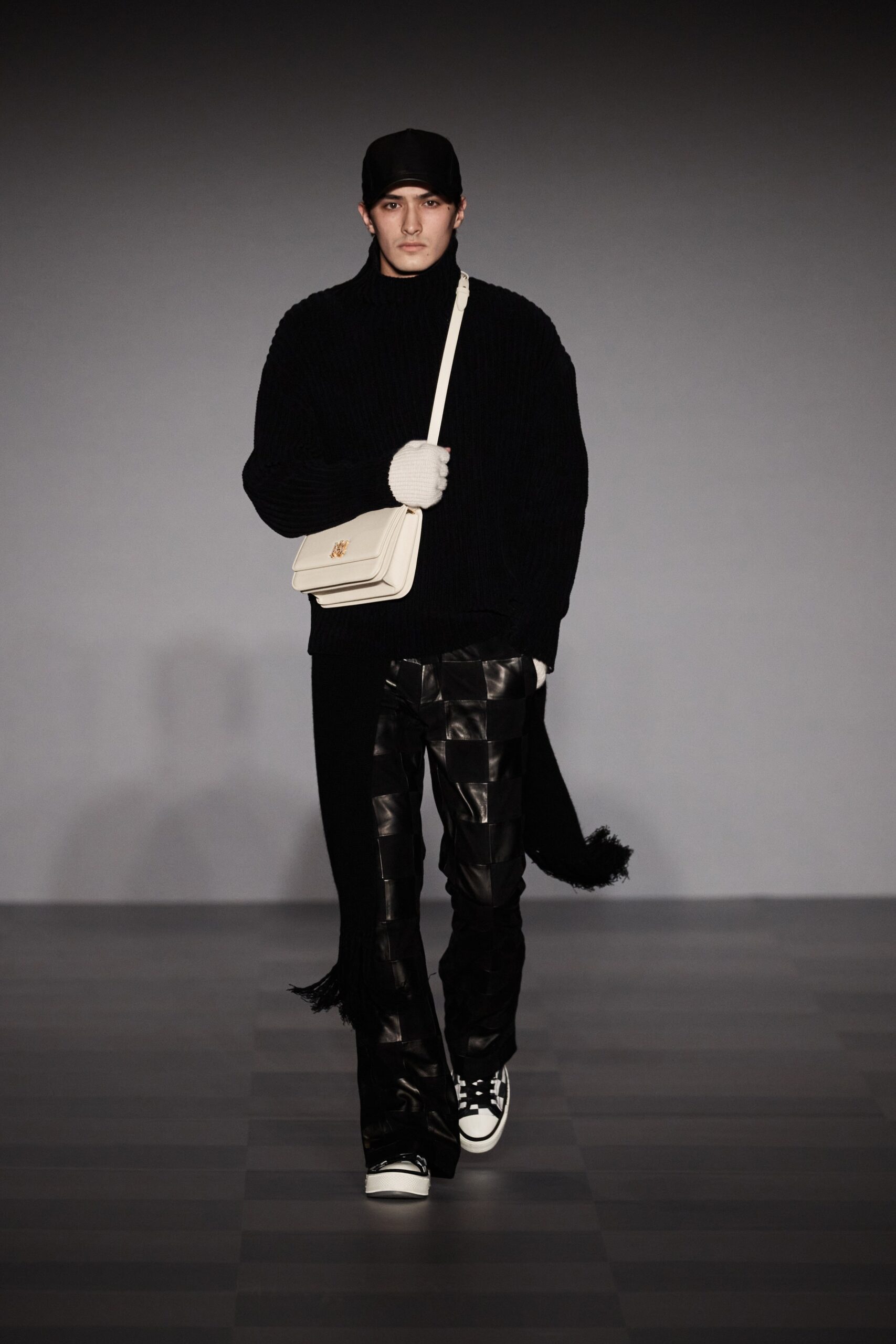 black wool relaxed sweater with leather pants