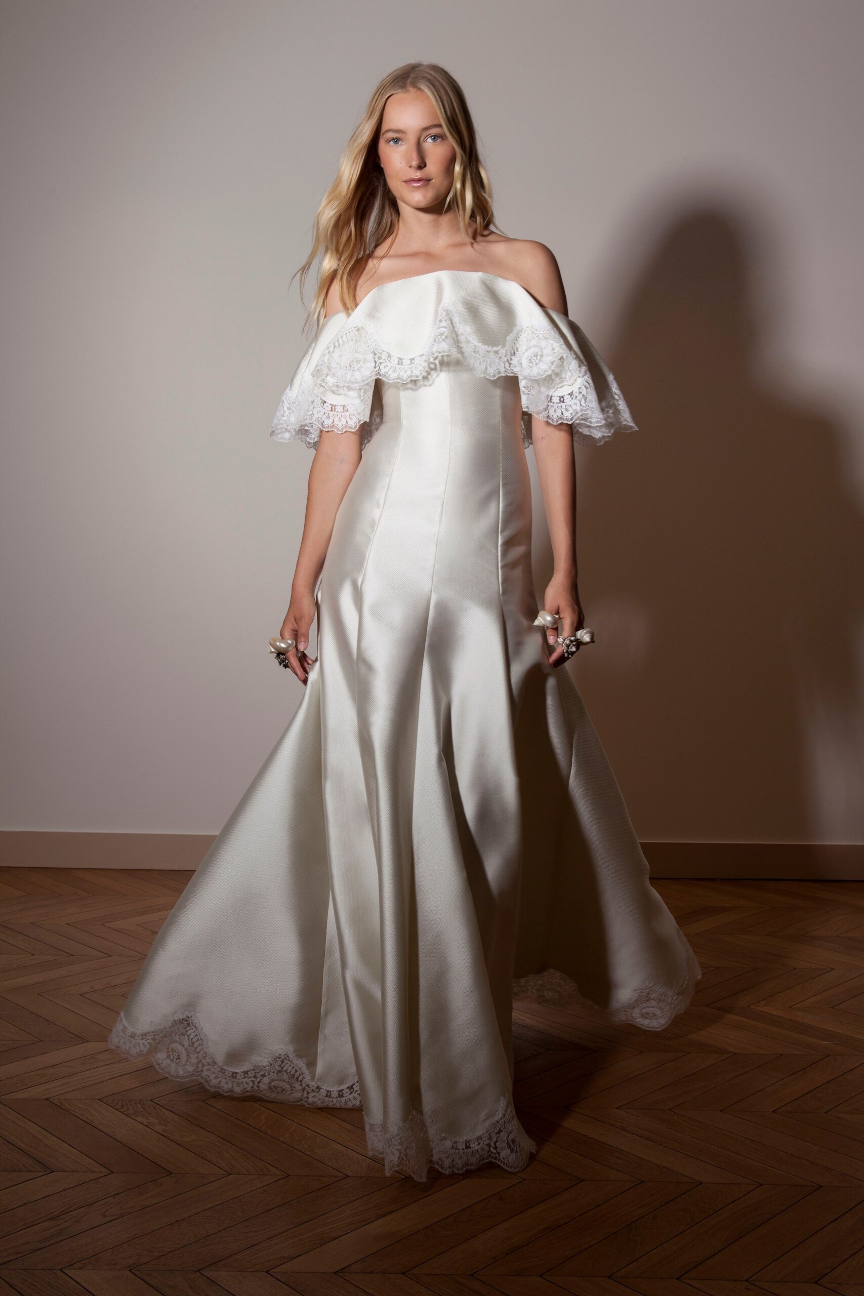 white silk off-shoulder gown