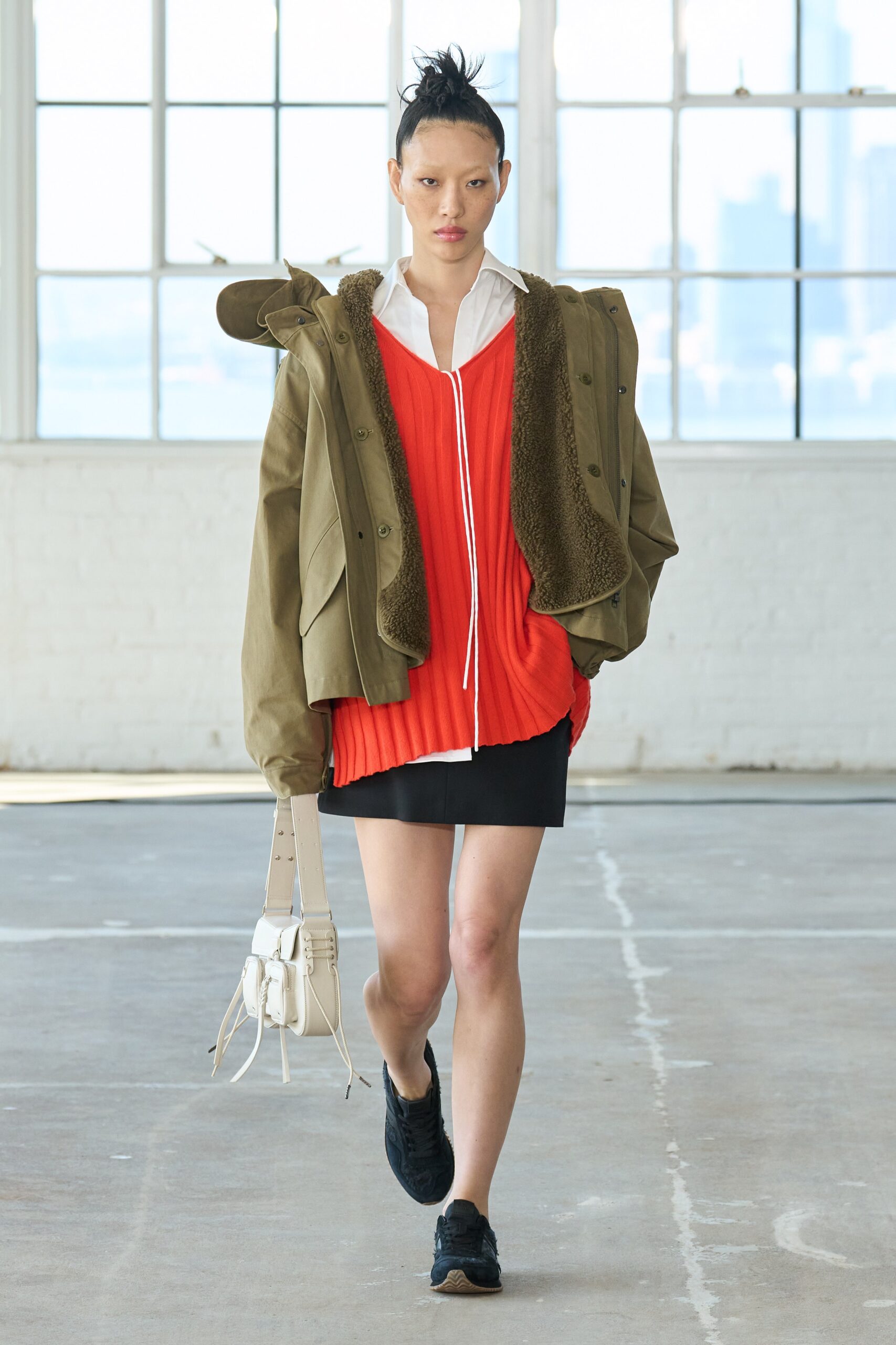 red cotton sleeveless v-neck fitted pleated top