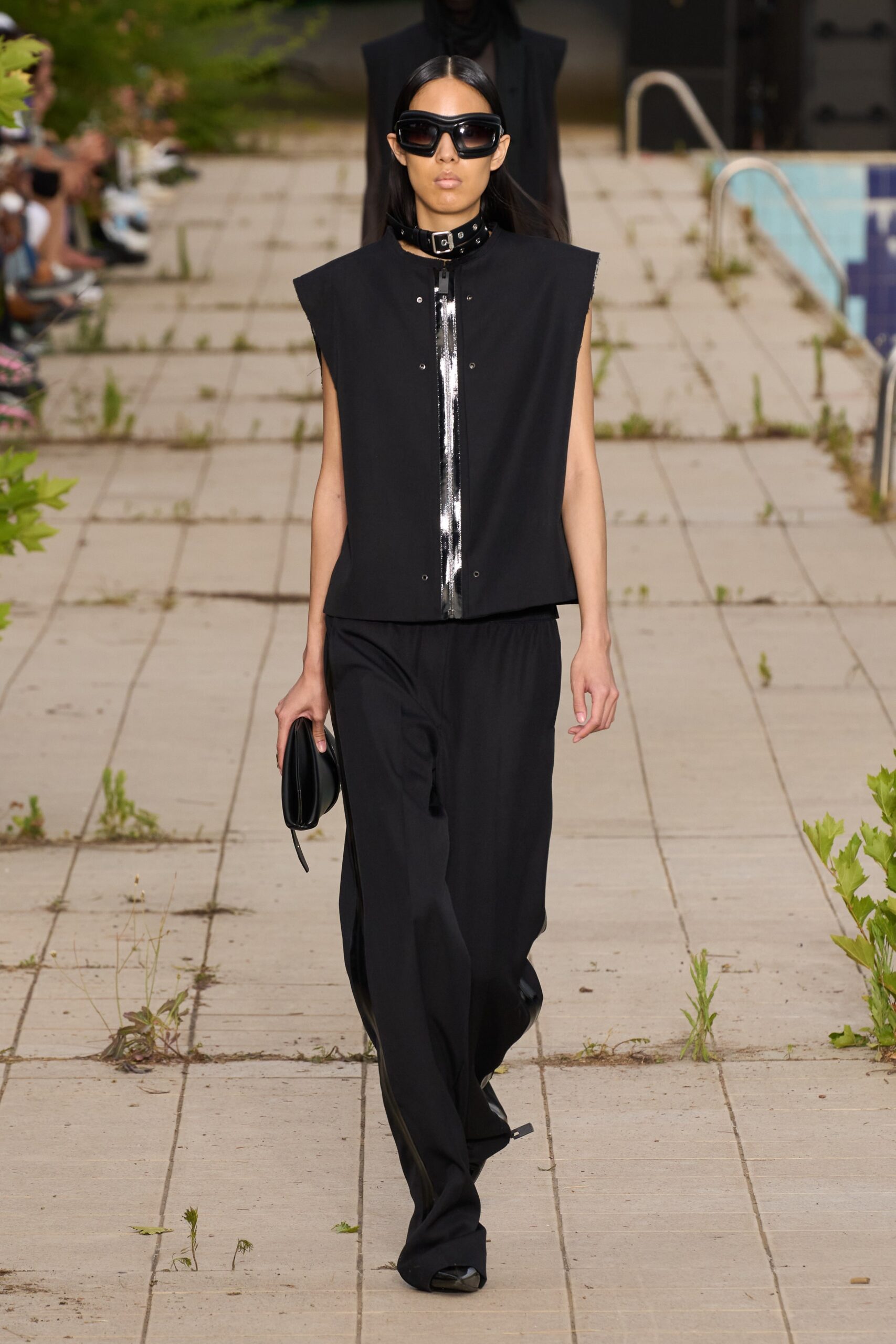 black fitted top and relaxed pants