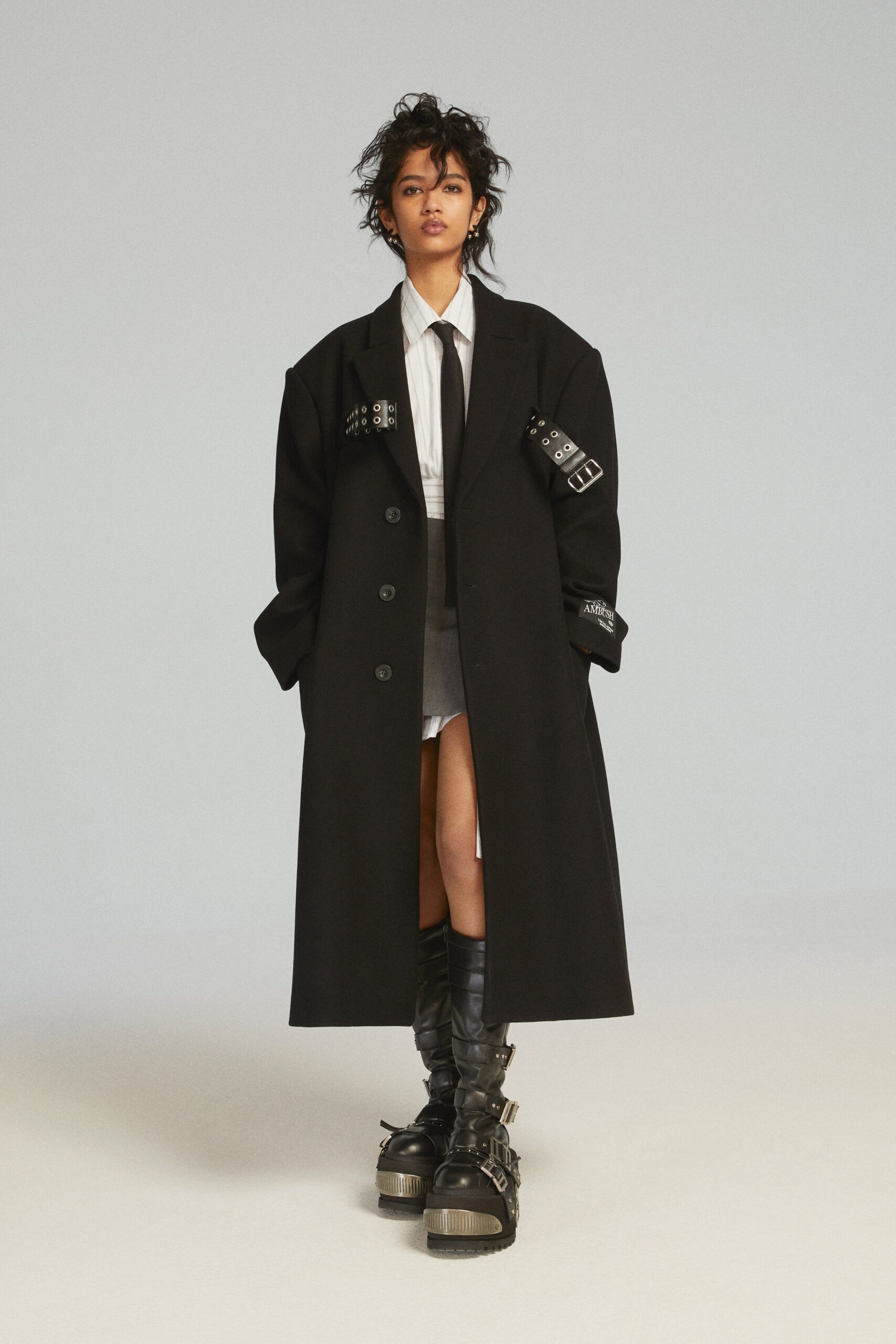 black wool long-sleeve collared oversized buttoned coat