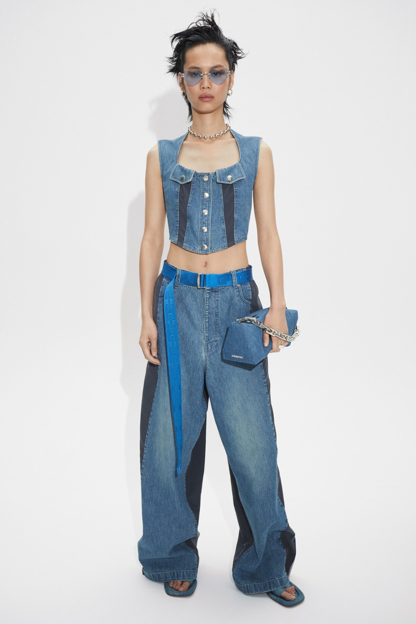 blue denim sleeveless collared fitted buttoned top